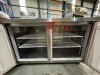 HOSHIZAKI UNDER COUNTER FREEZER. TWO DOOR. MODEL: FTC-150MNA. SERIAL: G00878C. 230 VOLT. STAINLESS STEEL. FOUR WIRE SHELVES. NOTE: RUST MARKS AT RIGHT HAND SIDE ON TOP AND ON RIGHT HAND SIDE ON BOTTOM. ON CASTORS. APPROX: 1500MM (W) X 600MM (D) X 800MM (H - 5