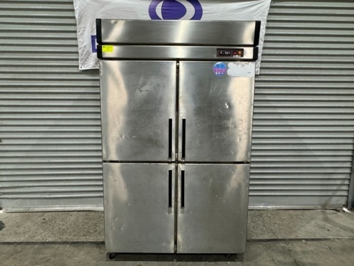 1 X COMMERCIAL UPRIGHT FREEZER. STAINLESS STEEL 4 DOOR . FITTED WITH SELF CONTAINED MOTOR. MAKE AND MODEL NOT VISIBLE.