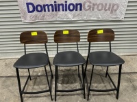 3 X BAR STOOLS. BLACK METAL FRAME WITH BLACK VINYL SEAT & TIMBER BACK. PLEASE NOTE ONE CHAIR HAS A SMALL CHIP ON THE TIMBER BACK.
